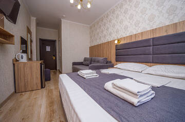 Четырехместный номер «Комфорт» в Гостинице Прометей 2