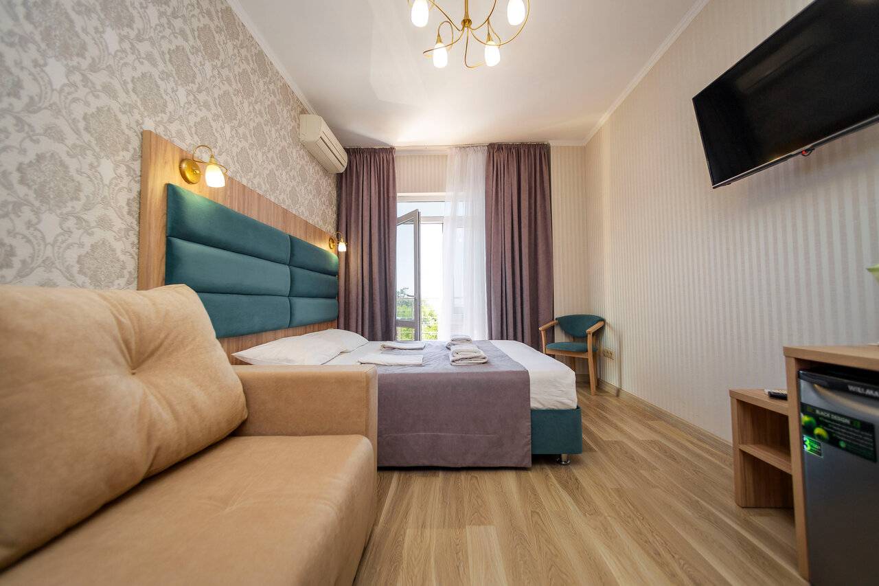 Четырехместный номер Делюкс